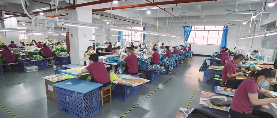 Eco-friendly textile production facility with green energy systems and recycling equipment visible